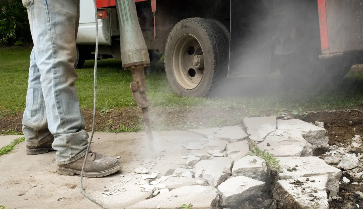 Concrete slab being broken up for removal